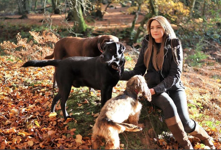 Jo out in the woods with her dogs